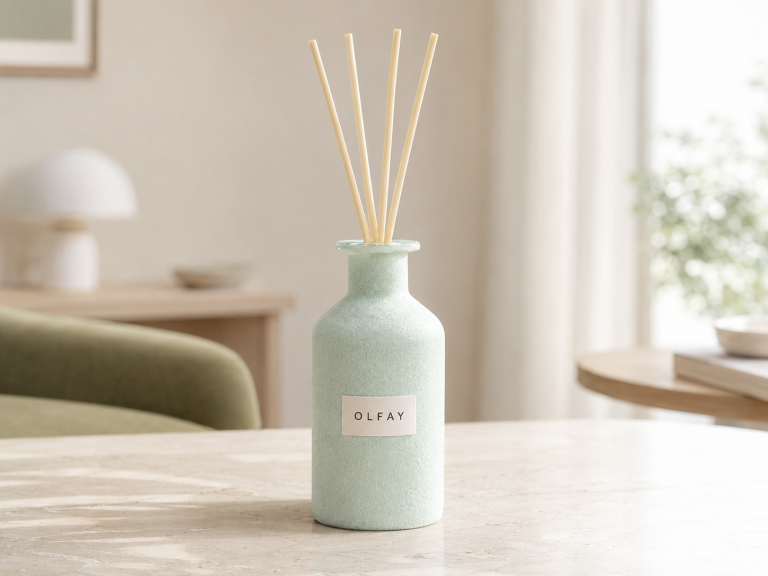 Wholesale 180ml velvet reed diffuser bottle with sage green finish and natural reeds for private label fragrance manufacturing