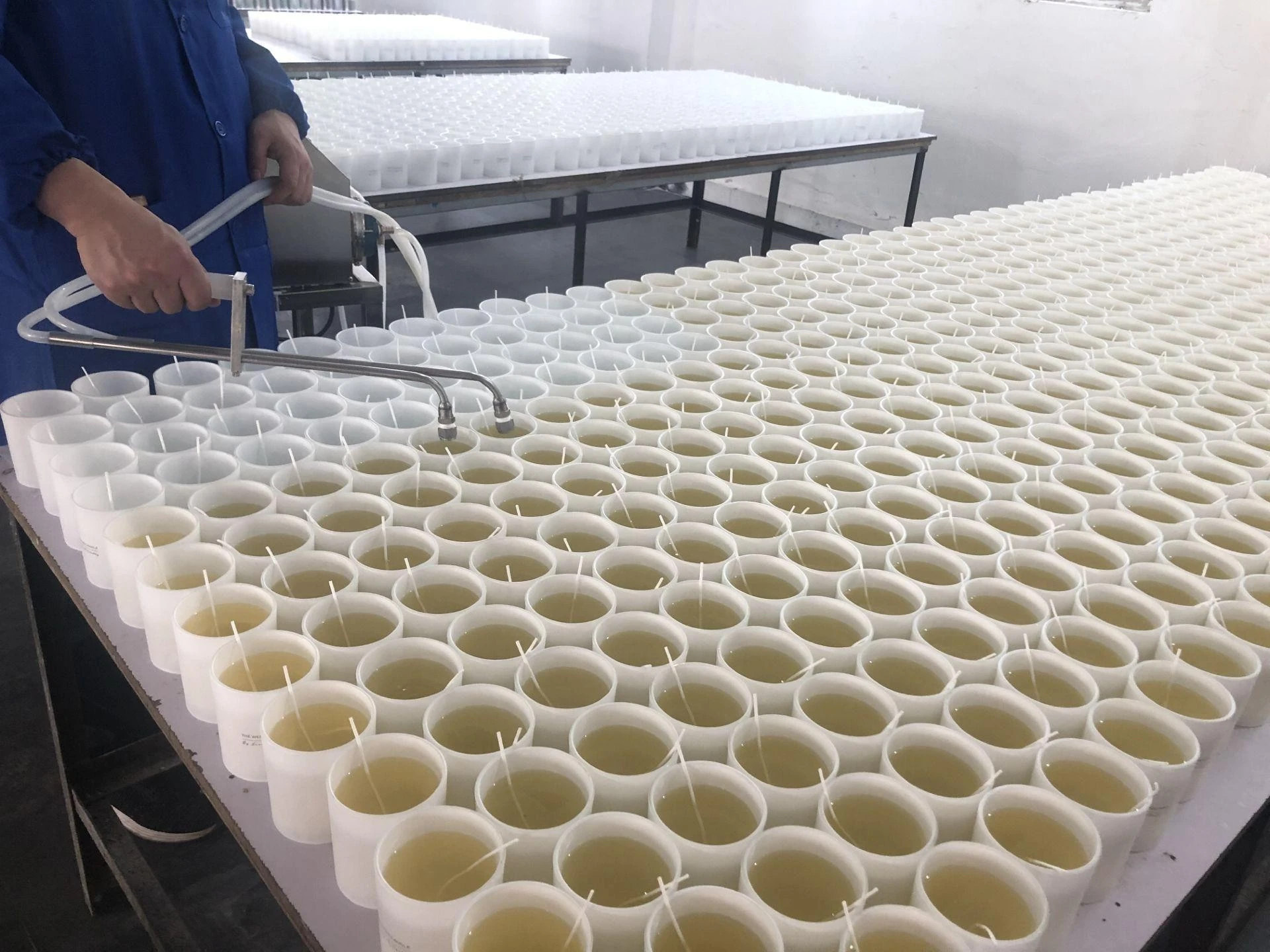 Candle pouring in a production workshop